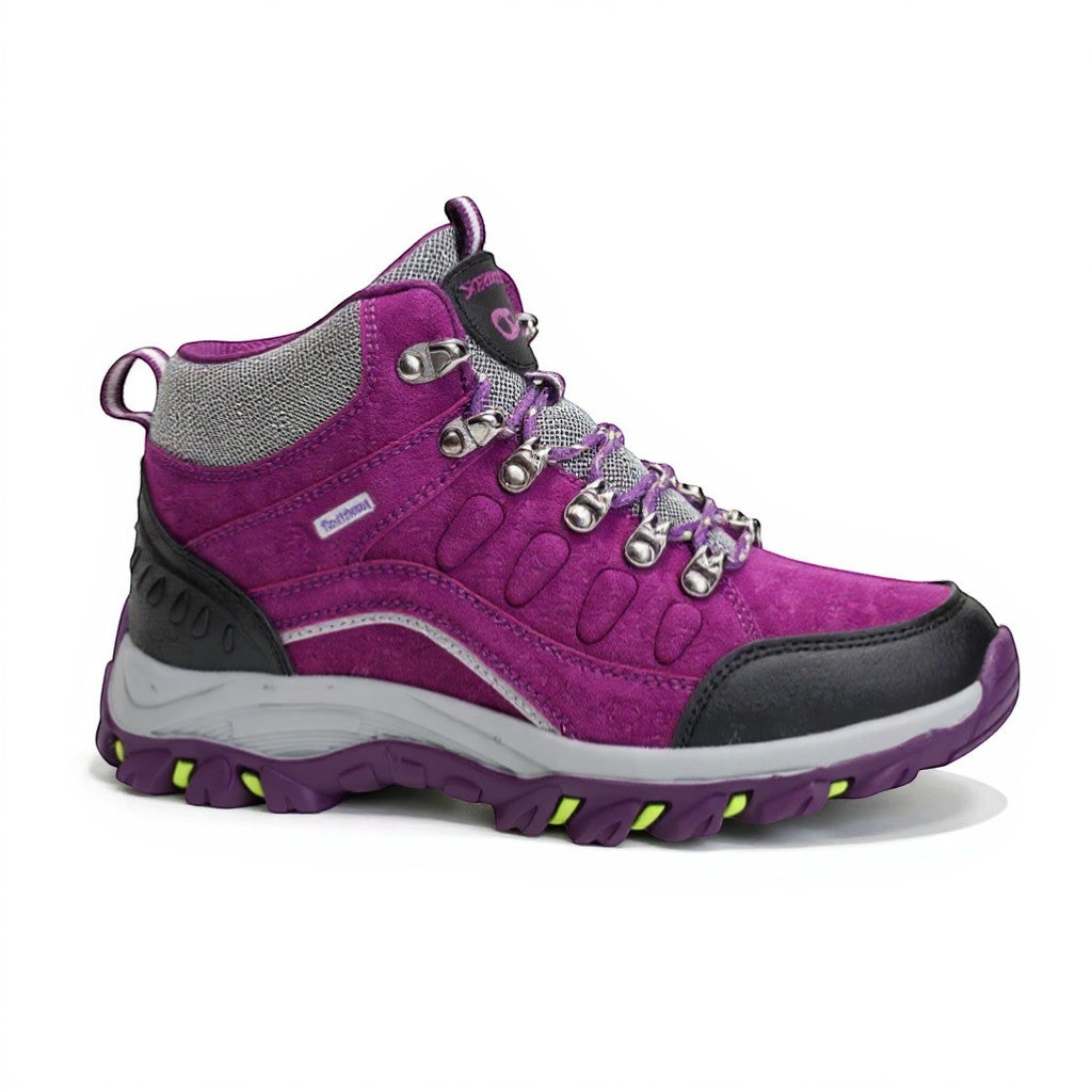 Chaussures de randonnée hiver femme violet avec protection contre le froid et maintien de la cheville.