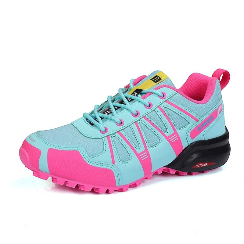 Chaussures de randonnée femme bleu et rose légères avec structure respirante.