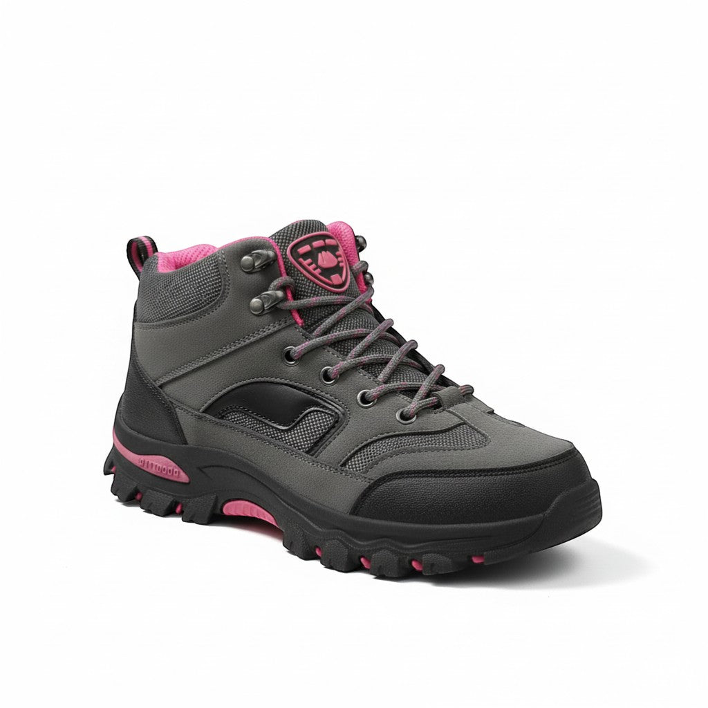 Chaussures de randonnée hiver femme noir et rose avec semelle antidérapante et maintien optimal.