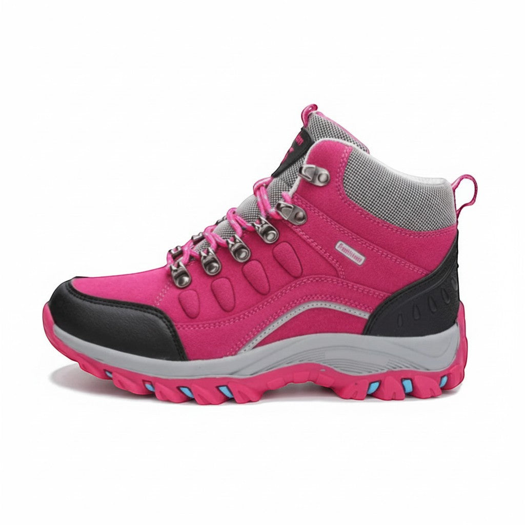 Chaussures de randonnée hiver femme rose avec semelle antidérapante et bon maintien.