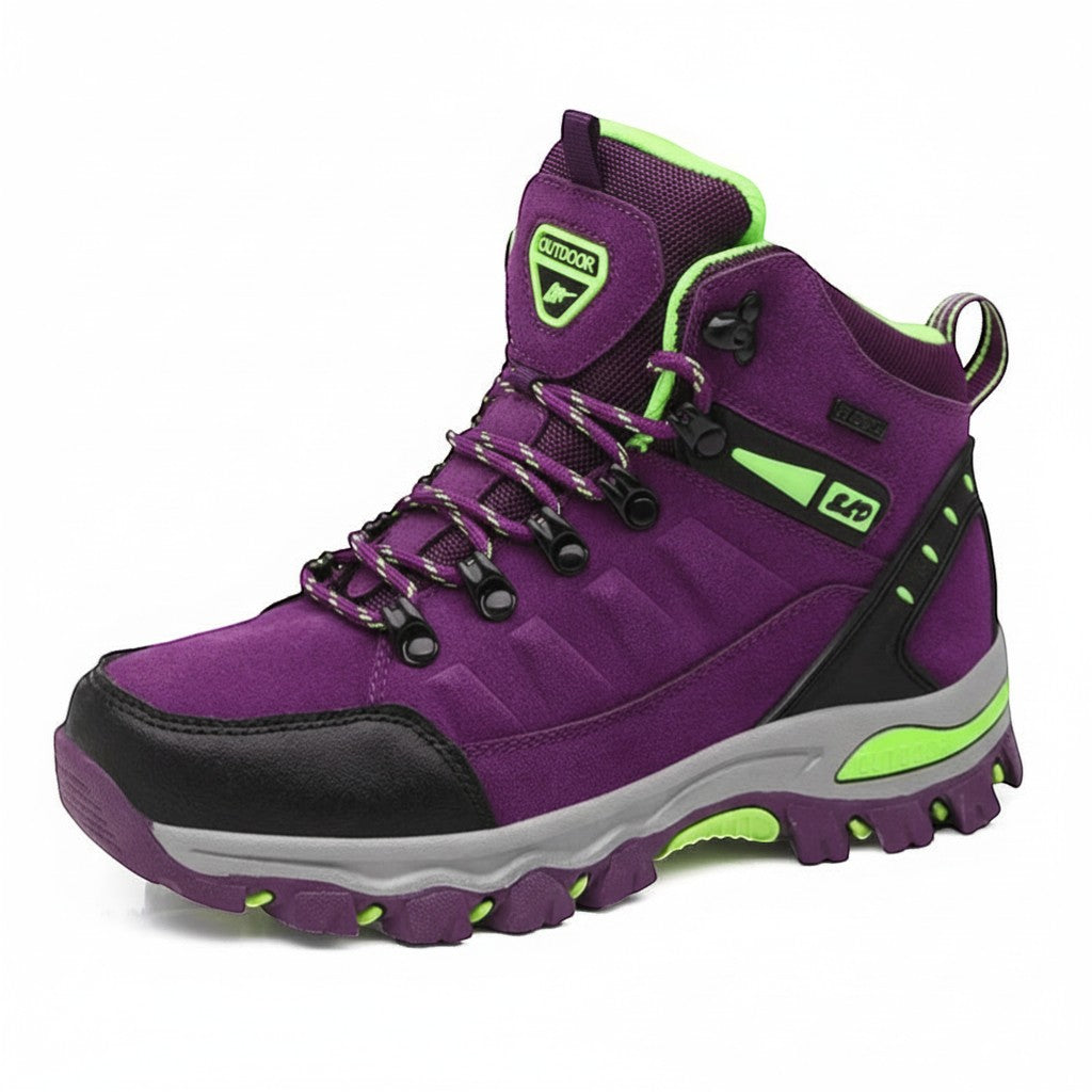 Chaussures de randonnée hiver femme violet avec semelle adhérente et protection pour les sorties hivernales.