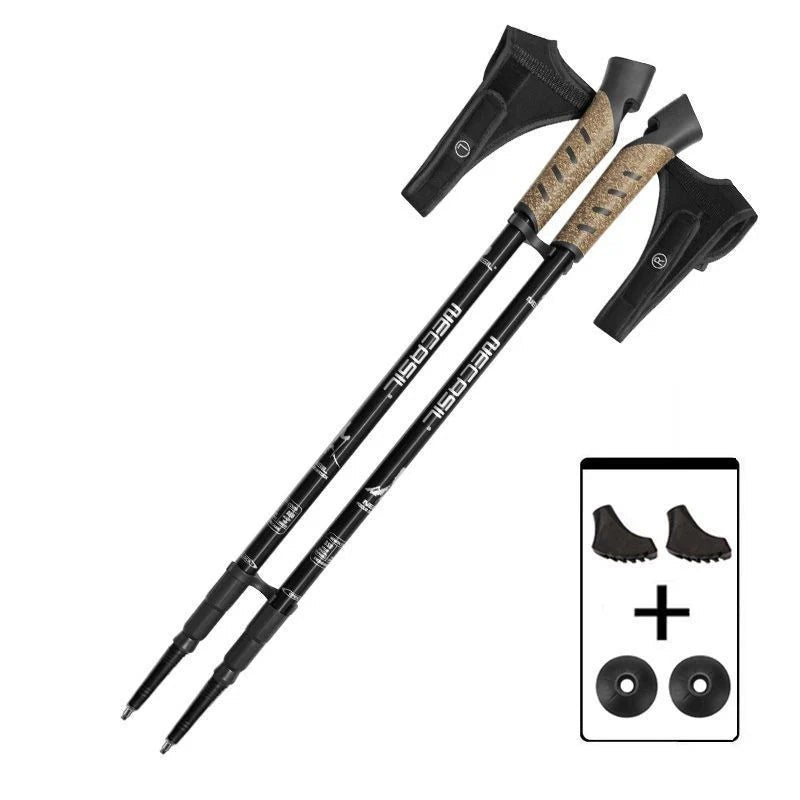 Paire de bâtons de randonnée noirs Passion Randonnée avec poignées en liège, embouts de protection et rondelles pour différents terrains.