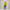 Ensemble de randonnée femme Passion Randonnée avec veste jaune à capuche et pantalon noir, présenté sur mannequin pour les sorties en plein air.