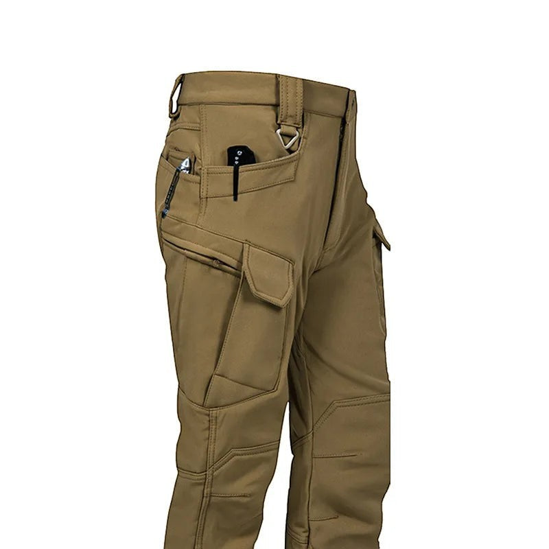 Pantalon de randonnée chaud pour homme Passion Randonnée, couleur beige, doté de nombreuses poches cargo et d'un design tactique, idéal pour les aventures en plein air.