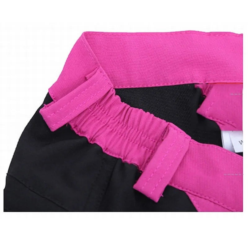 Zoom sur la taille élastique rose d’un pantalon de randonnée femme Passion Randonnée, avec passants et finition souple pour plus de confort.