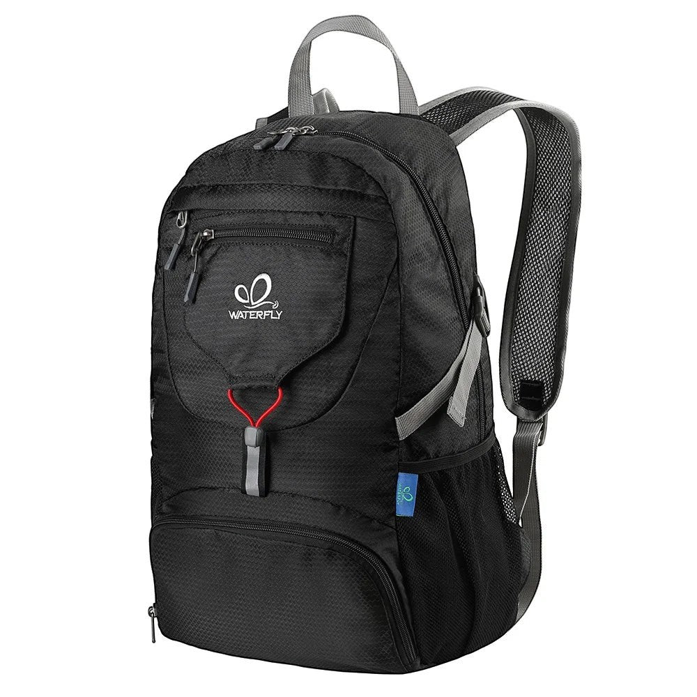Sac à dos de randonnée pliable Passion Randonnée noir 20 L en nylon, avec ceinture rembourrée et poches latérales en filet.