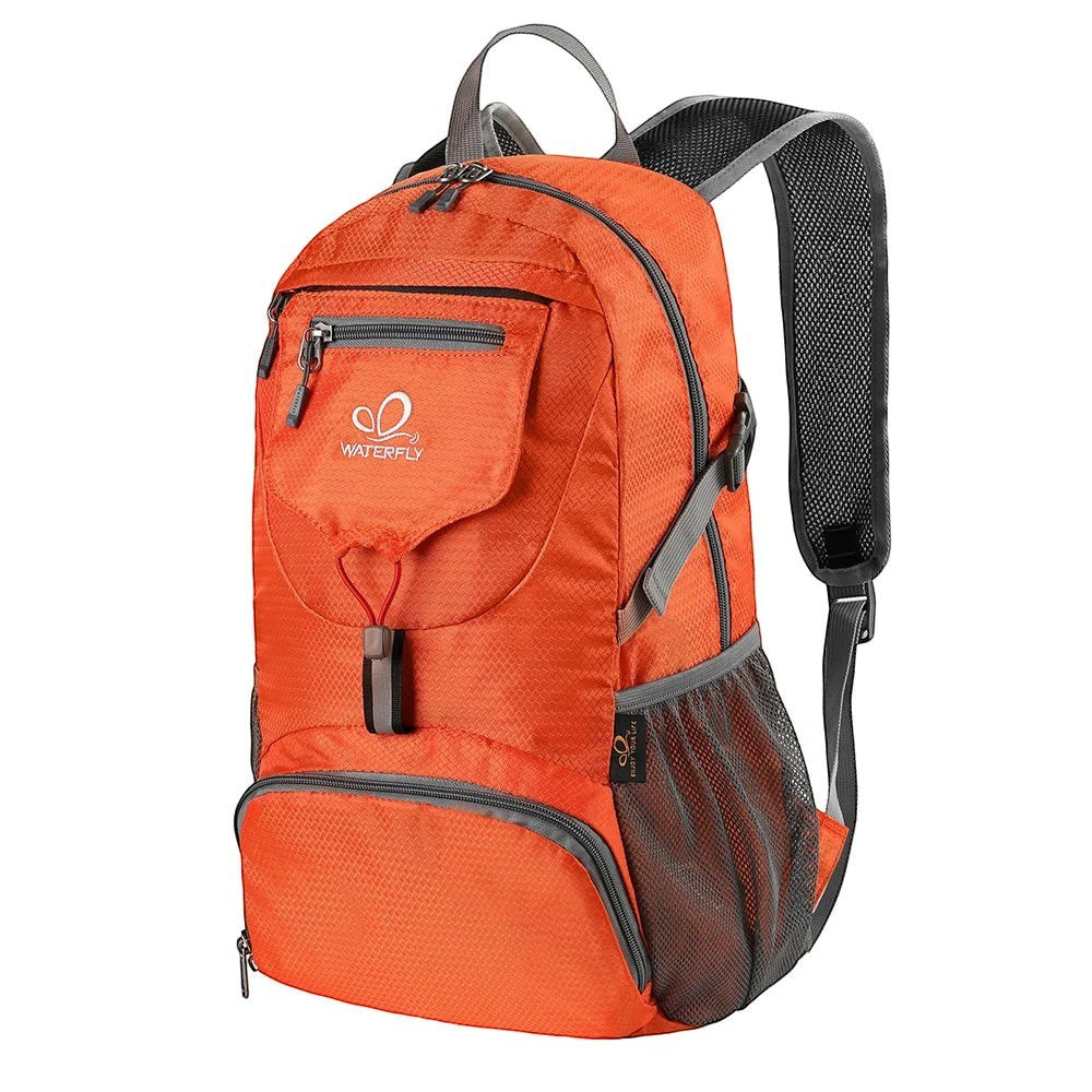Sac à dos de randonnée pliable Passion Randonnée orange, 20 L, en nylon, avec ceinture rembourrée et poches en filet.