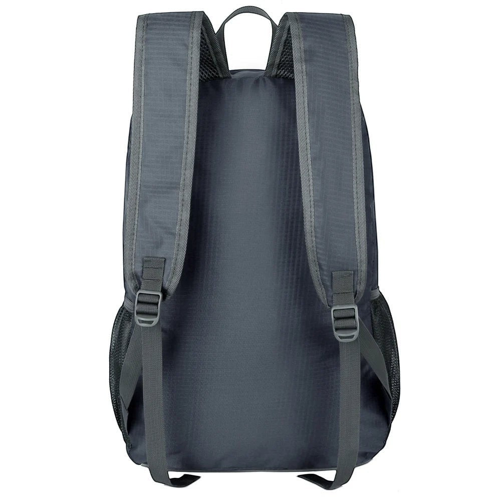 Sac à dos de randonnée Passion Randonnée pour femme, en nylon imperméable, pliable, léger, gris foncé, avec poches latérales en filet.