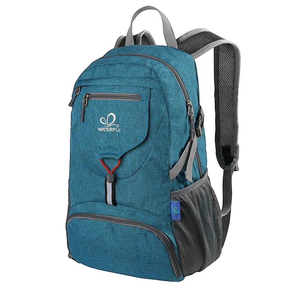 Sac à dos de randonnée pliable Passion Randonnée bleu, 20 L, en nylon, avec ceinture rembourrée et poches latérales en filet.