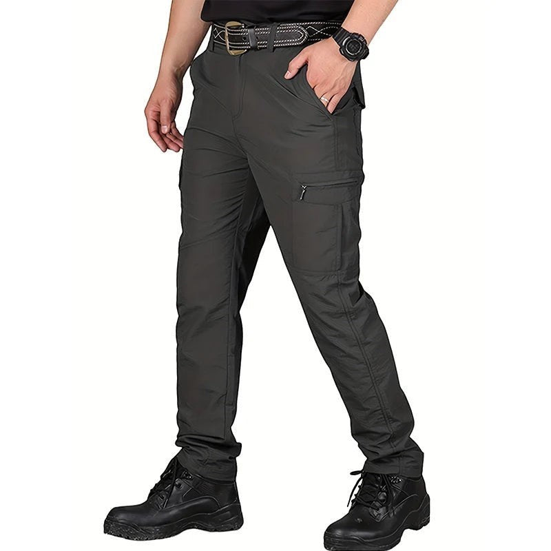 Pantalon randonnee homme gris fonce nylon multi-poches respirant Passion Randonnee.