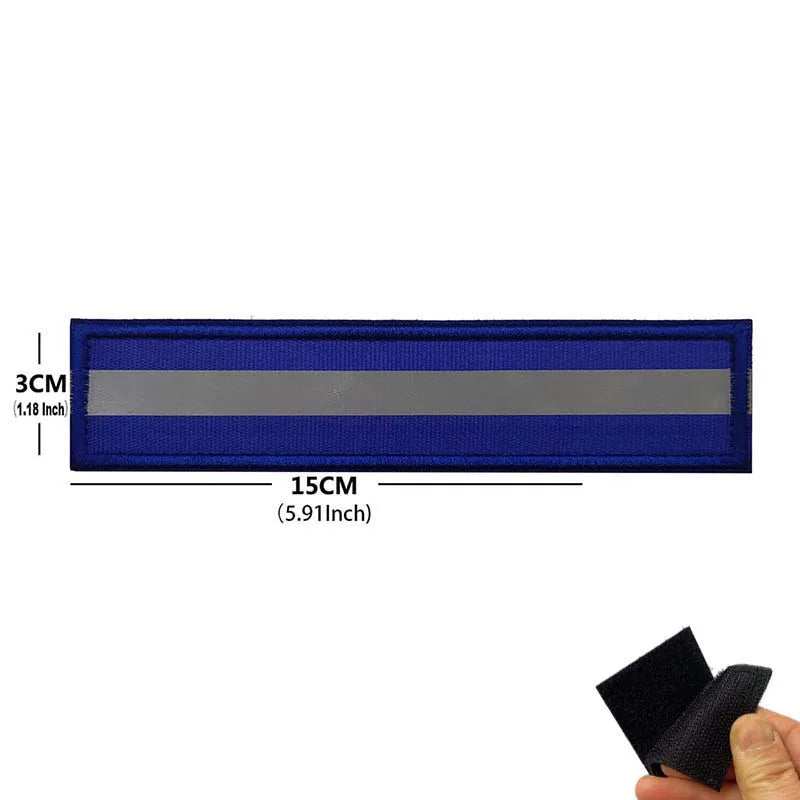 Patch réfléchissant sécurité randonnée velcro sac à dos porté en extérieur sur sentier Passion Randonnée.